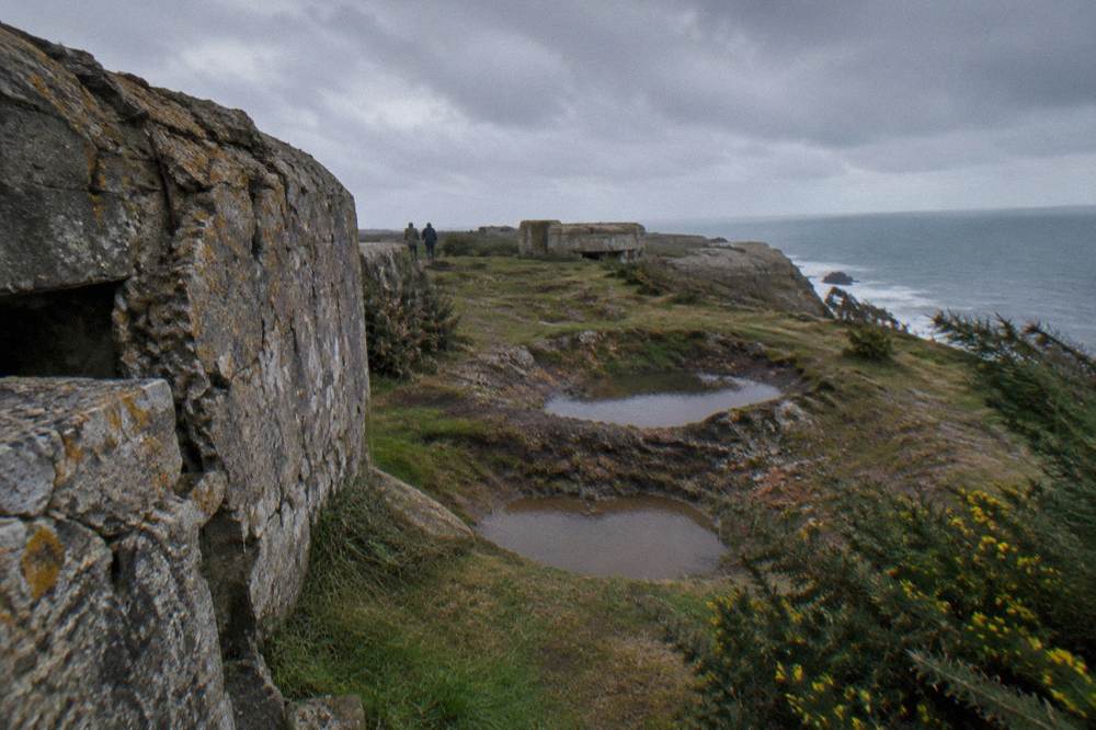 Cloud moving over the clifftop bomb-cratered ground at Pointe du Hoc
