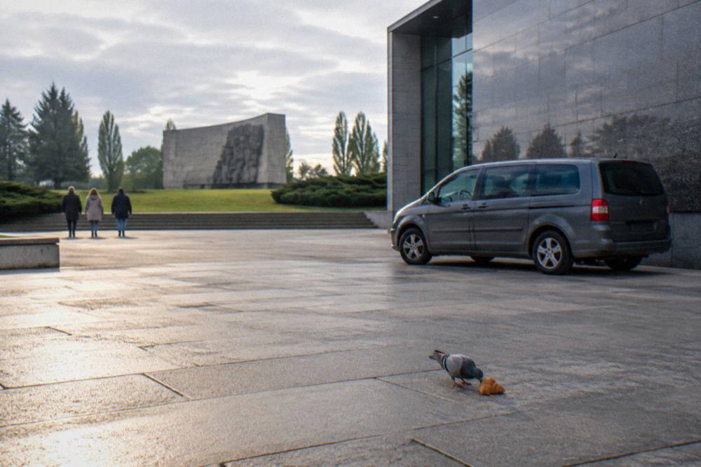 Seven-seat van parked near the Caen Memorial esplanade