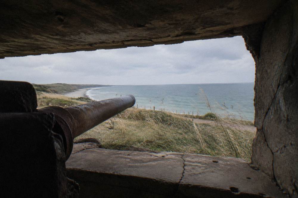 Concrete German bunker remains on a clifftop overlooking the sea